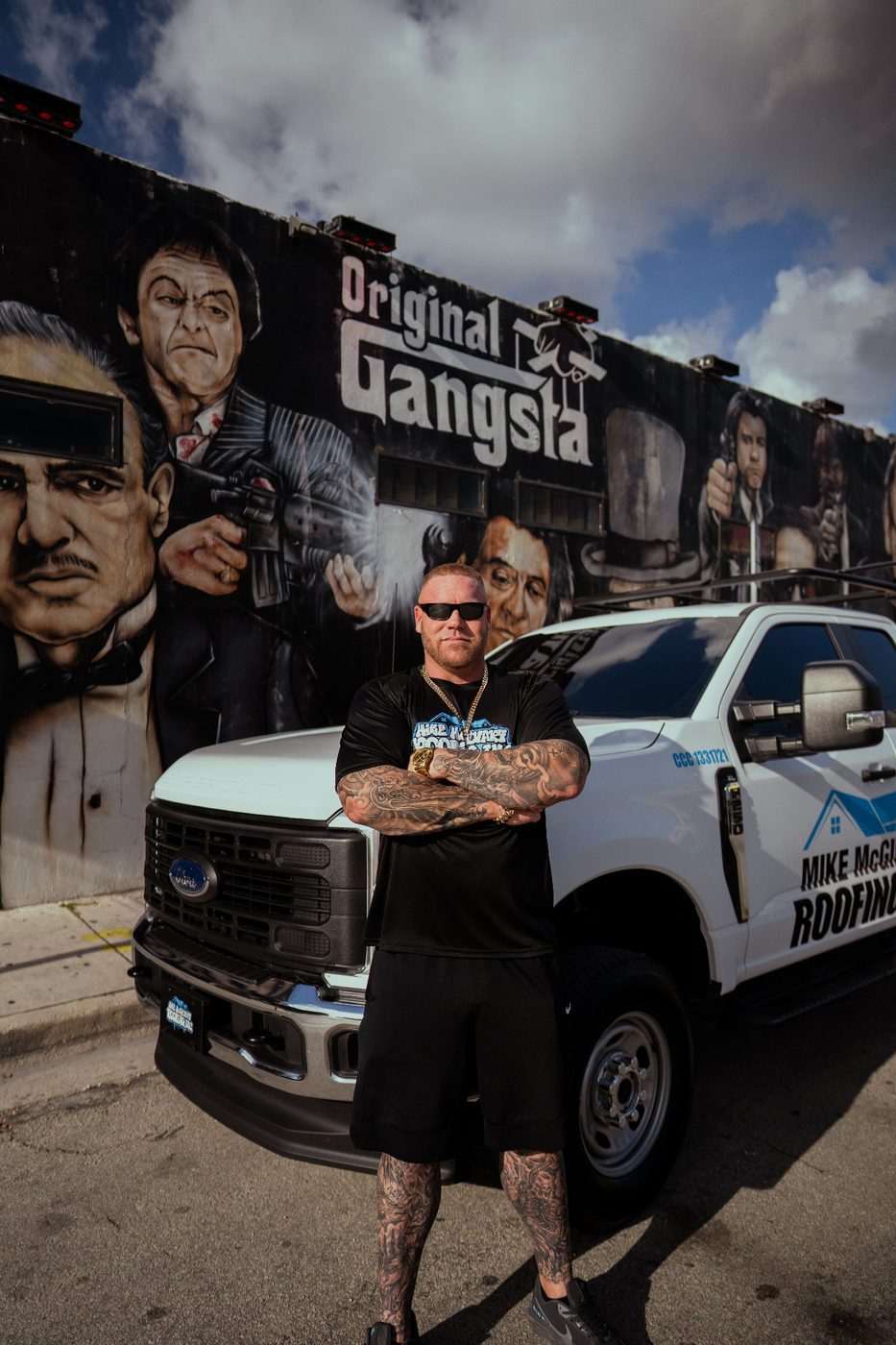 Mike McGilvary with his roofing truck