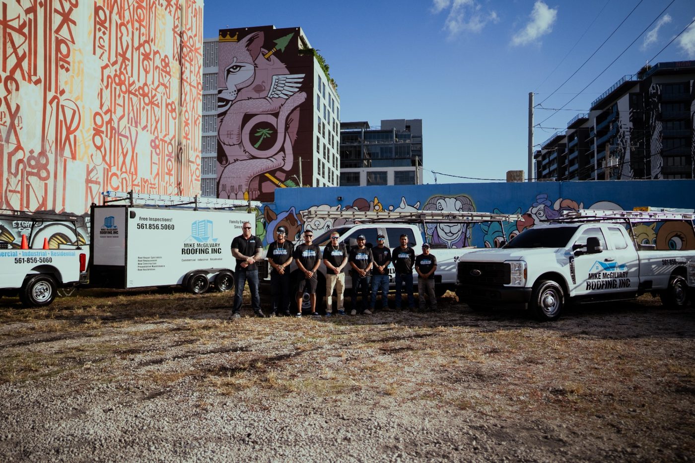 Mike McGilvary Roofing team with their trucks